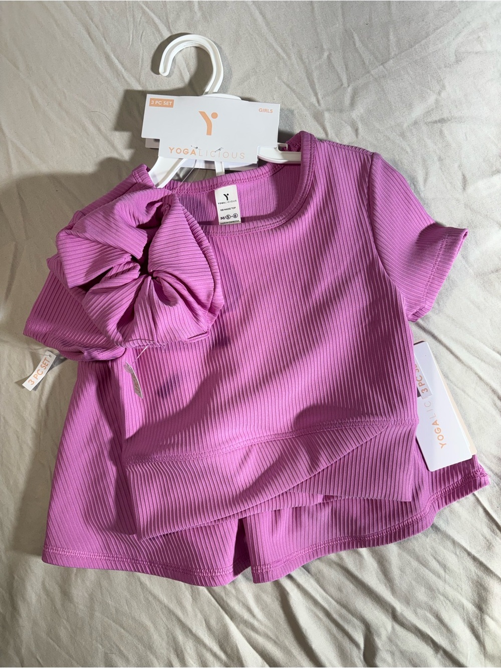 Yogalicious Girls Magenta Ribbed Short Sleeve Top with Bow Accent